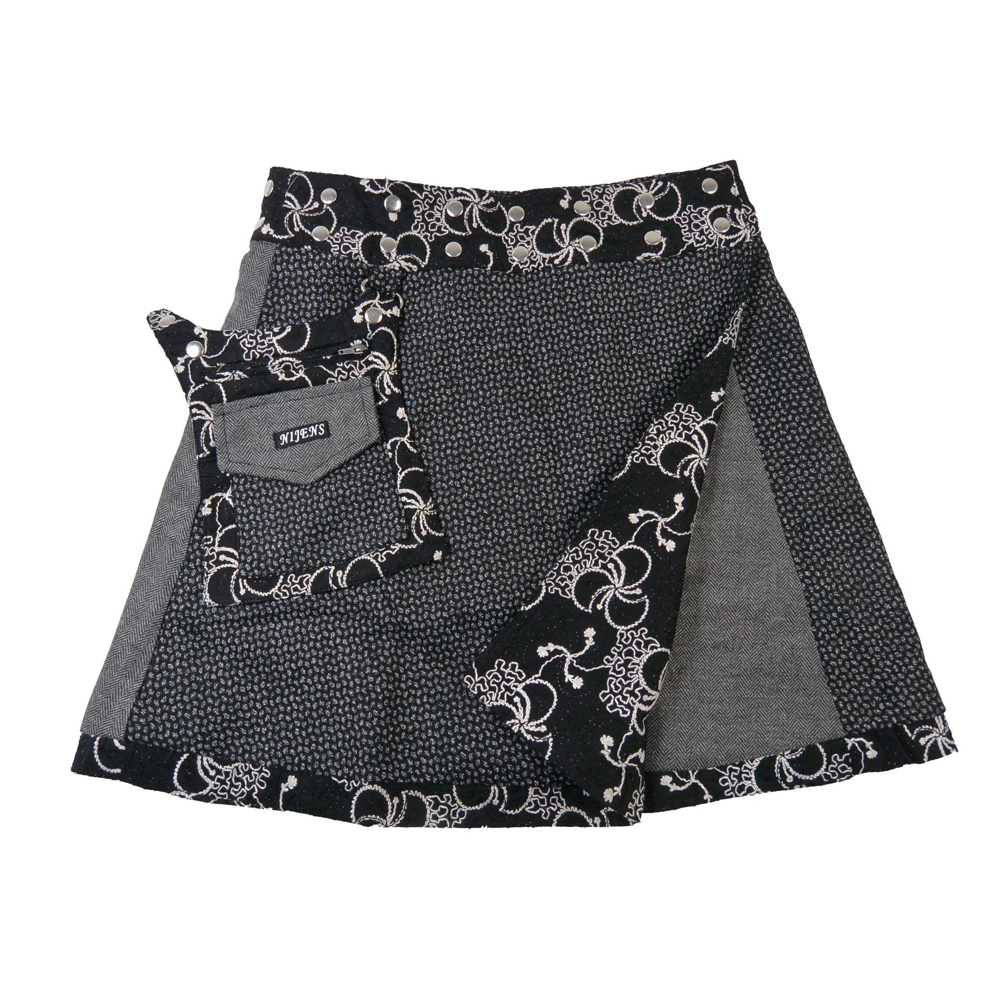 Wendbarer Tweed-Rock in Grau mit Blumenmuster. 