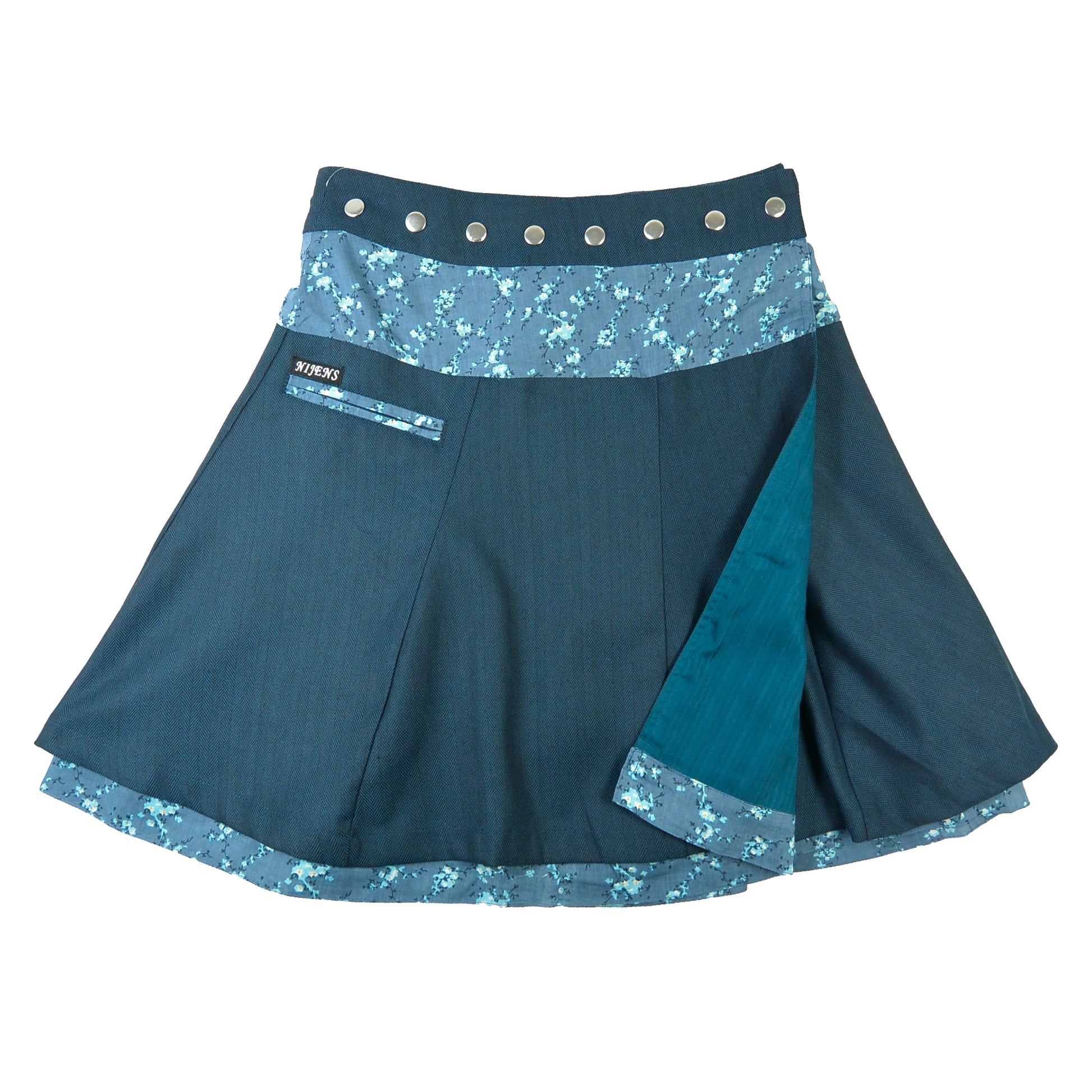 Reversibler Nijens Winter-Wenderock in Petrol mit floralem Bund und türkisfarbener Innenseite. Warmer Wickelrock mit zwei Designs.