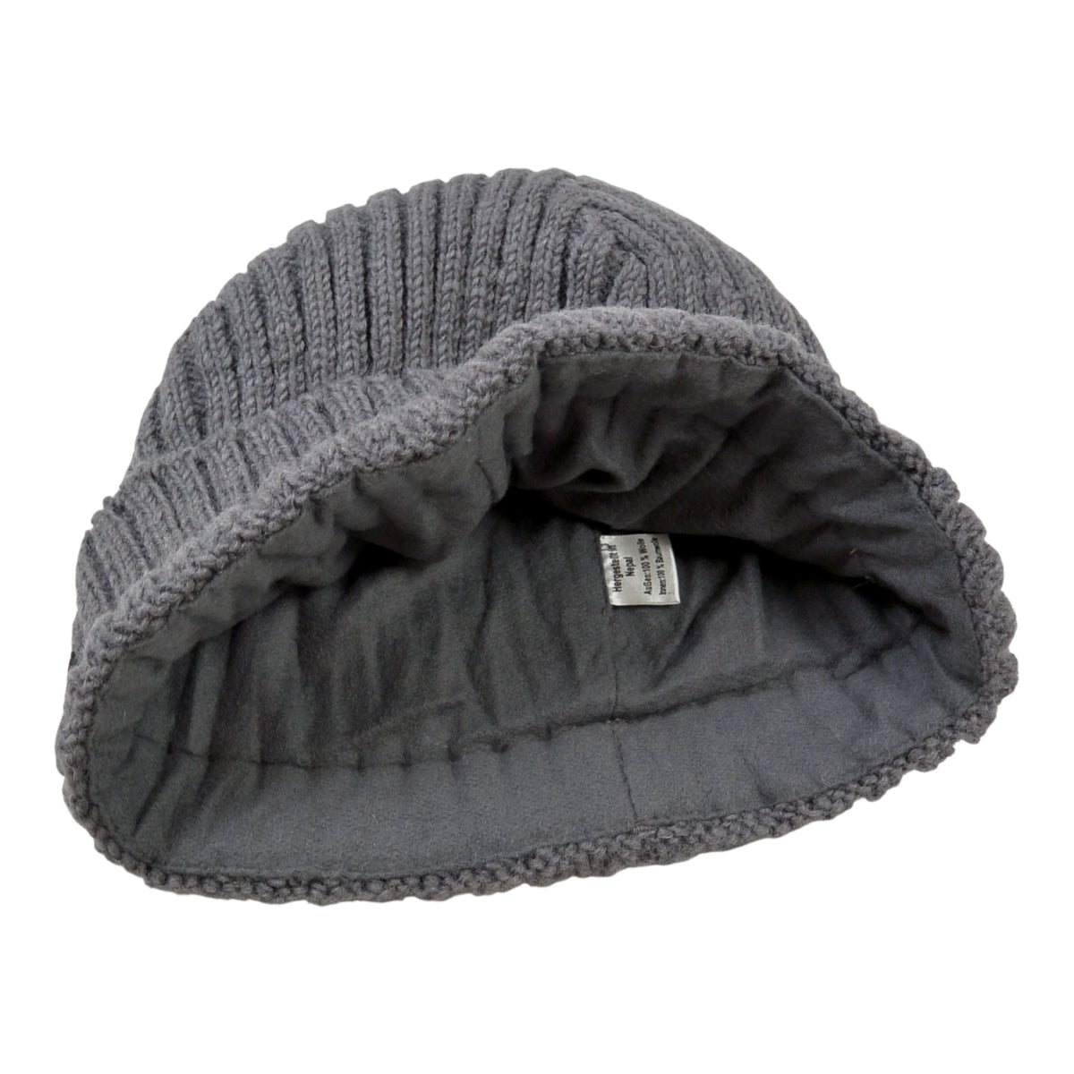 Nijens Short Beanie aus Schurwolle Anthrazitgrau mit breitem Rippstrick-Umschlag und sichtbarem Baumwoll-Innenfutter am Mützenrand.
