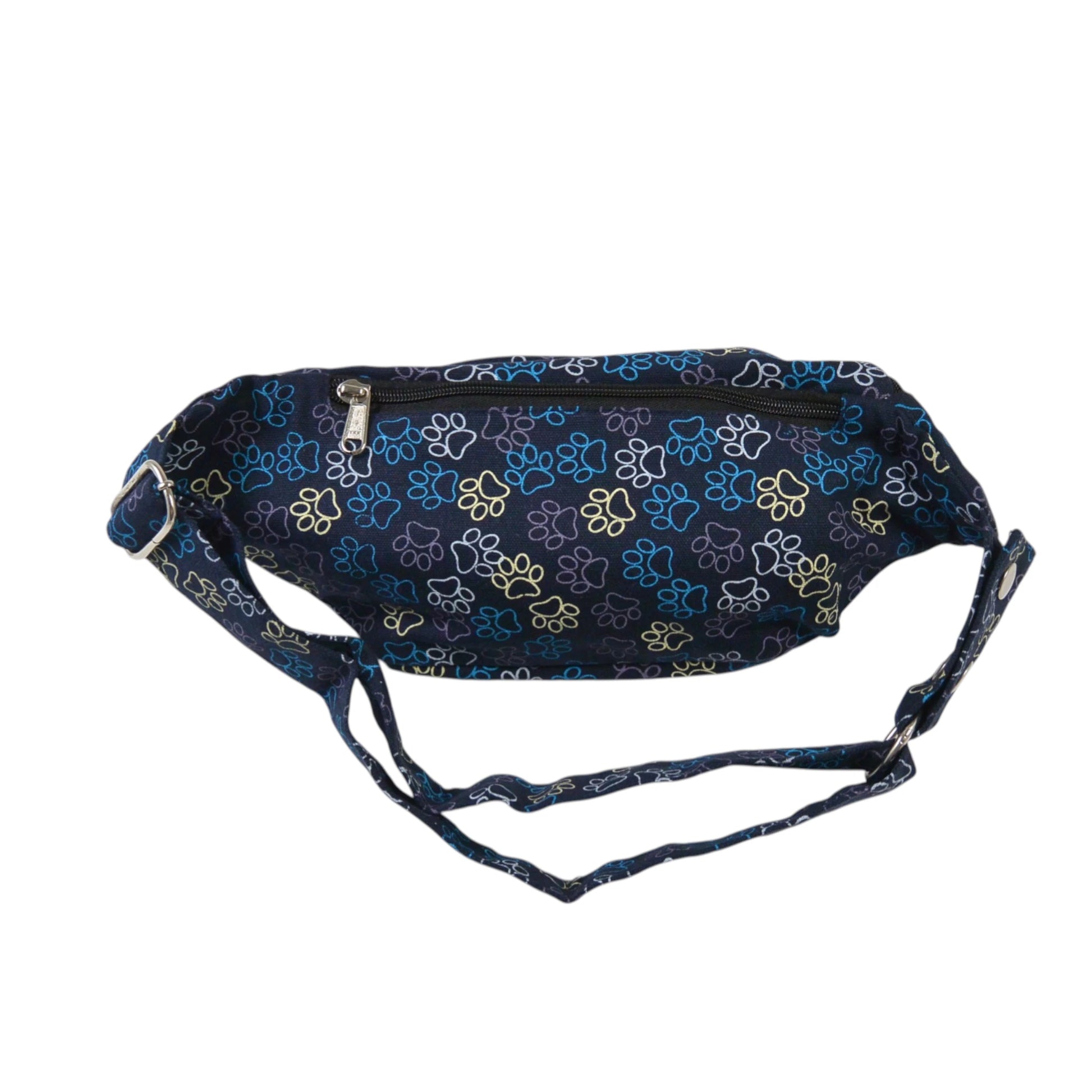 Canvas-Bauchtasche Torino in Kobaltblau mit farbenfrohem Pfotenabdruck Muster für den Alltag und auf Reisen. Rückansicht.