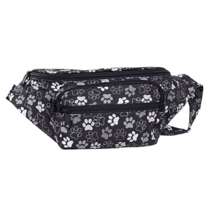 Schwarze Gassi-Tasche Torino mit weißem Pfotenmuster und wasserabweisendem Stoff – ideal für Spaziergänge mit Hund bei Wind und Wetter