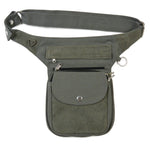 Gesamtansicht der Tasche mit geschlossenem Deckel, geprägtem Leder und mehreren Reißverschlüssen.