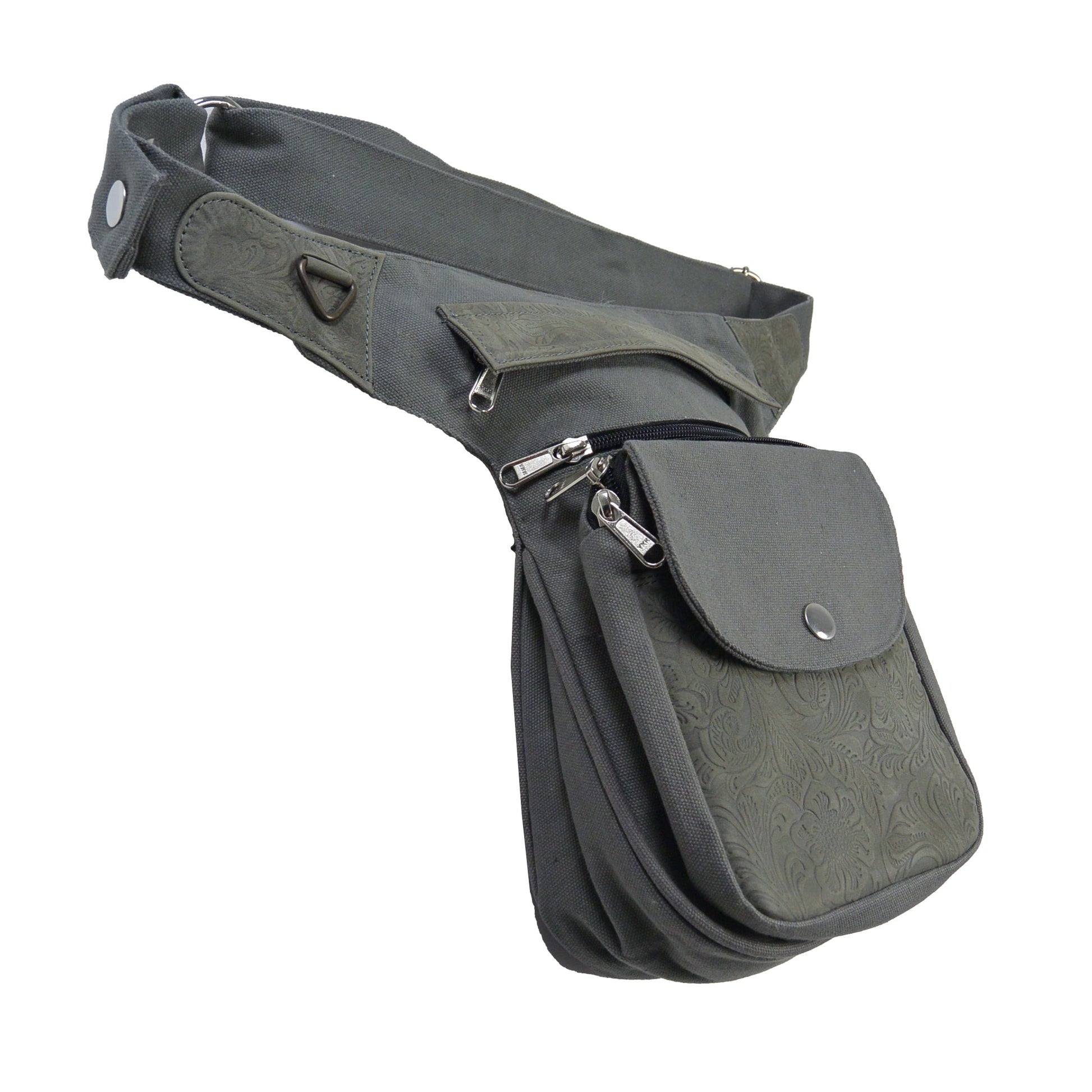 Seitliche Perspektive der Tasche mit zwei Reißverschlussfächern und floralem Leder auf der Vorderseite.