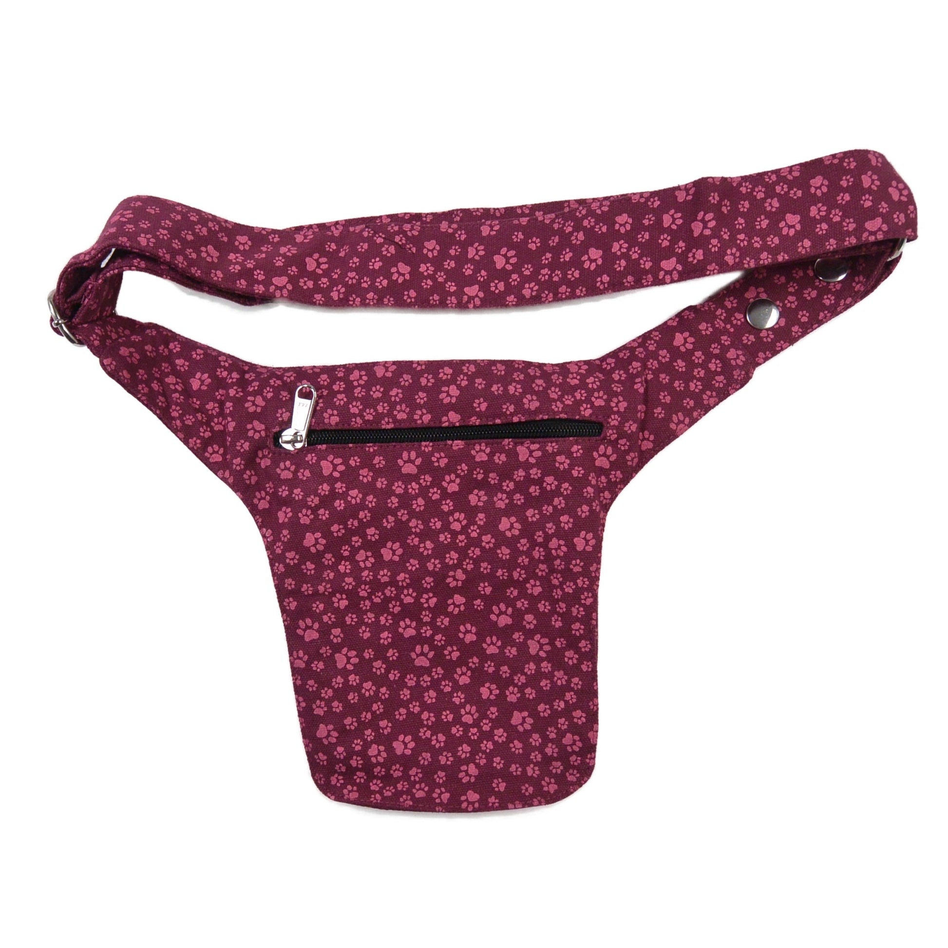 Bauchtasche aus robustem Baumwollstoff in Magenta mit kleinem Pfotenmuster. Auf der hinteren Seite befindet sich ein weiteres Reißverschlussfach. 
