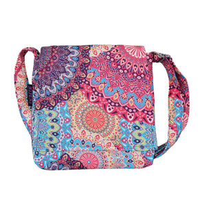 Umhängetasche aus Stoff mit farbenfrohem Mandala-Muster in Rosa, Blau und Gelb – kleine Tasche Chotu von Nijens