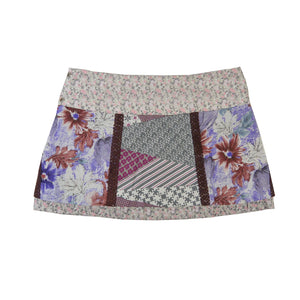 Sommerrock aus Baumwolle Beige in buntem Mustermix. Umfang ist verstellbar mit doppelter Druckknopfleiste mit Seitentasche. 2 Bild