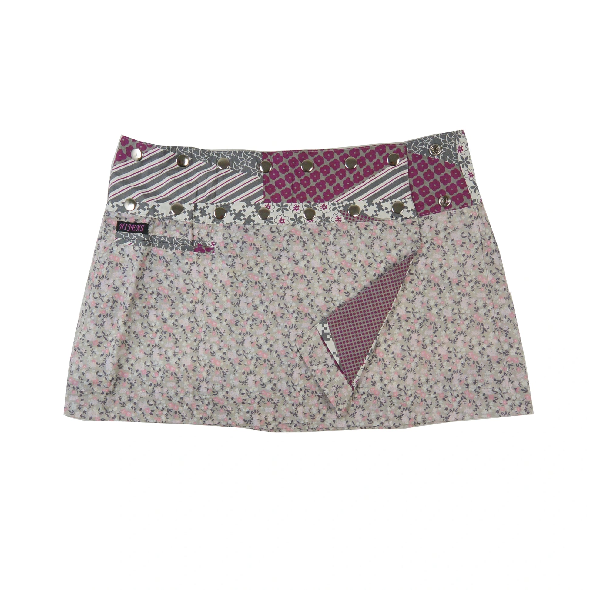 Sommerrock aus Baumwolle in Beige-Rosa im Mustermix. Umfang ist verstellbar mit doppelter Druckknopfleiste mit Einsteckfach.