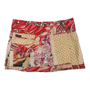 Wenderock von Nijens im Patchwork-Stil mit floralen Mustern in Rosa und Beige. 