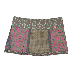 Minirock Wenderock von Nijens im Patchwork-Stil mit floralen Mustern in Rosa, Grün und Türkis. Bild 2