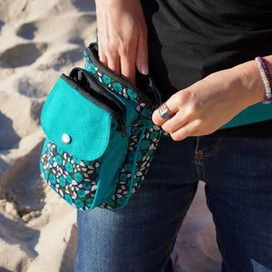 Nijens Tasche hat zwei flüssigkeitsabweisende Innenfutter