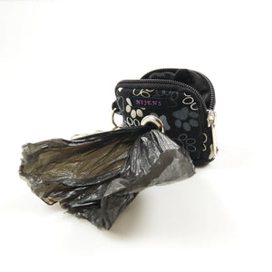 Nijens Kleine Beuteltasche mit Öse, Karabiner, Mini Beutel mit Pfotenabdruck in Schwarz